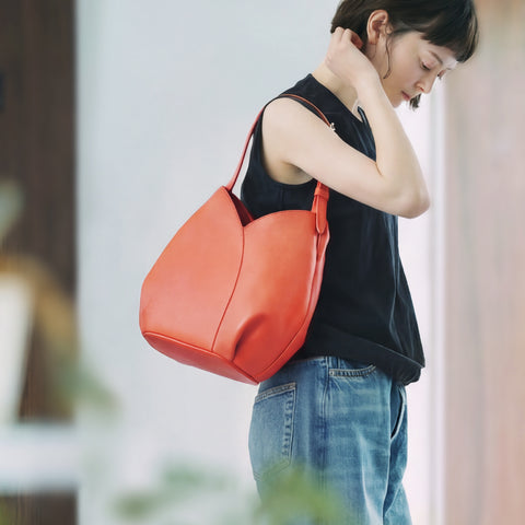 春夏の光を纏う。瑞々しいオレンジを主役に