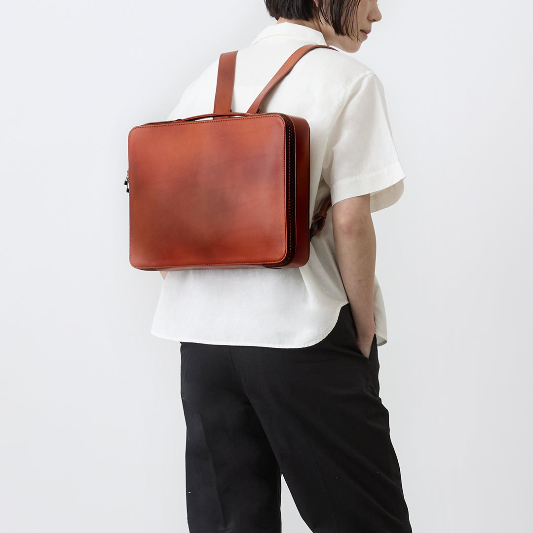 MOTHERHOUSE ANTIQUE BRIEF BACKPACK キャメル